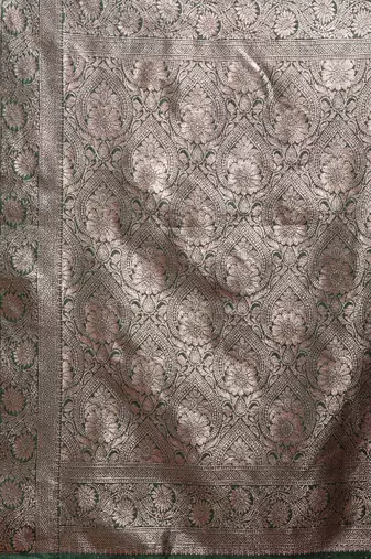 forest green woven soft silk blend saree with rich silver zari