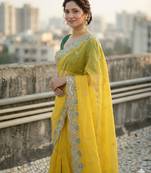 Yellow color embroidery work gold crush silk saree 
