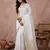 Sutriti women's white pure linen saree with gold zari border & blouse piece