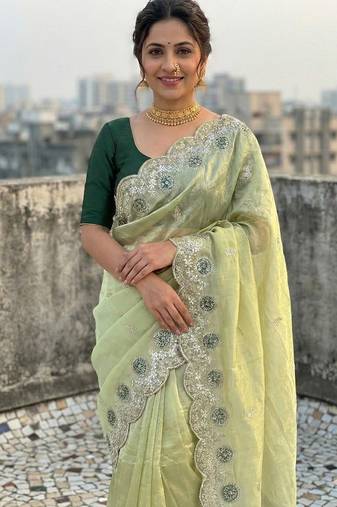 light green color embroidery work gold crush silk saree 