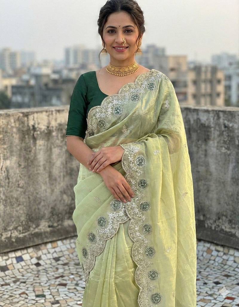 light green color embroidery work gold crush silk saree 