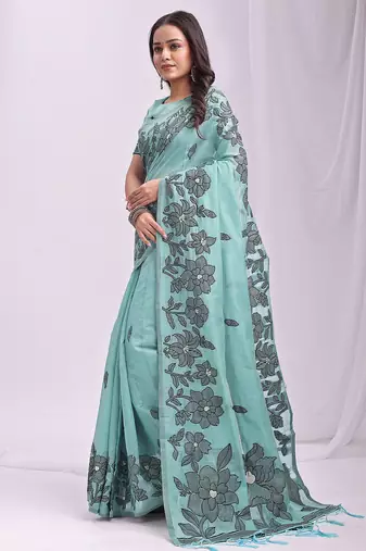 sky blue linen saree with zari woven floral motifs