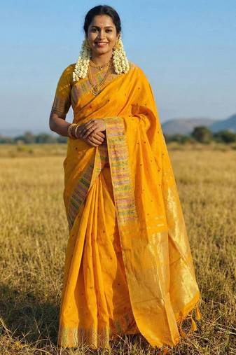 Sutriti haldi special mustard yellow soft silk saree with traditional zari border