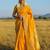 Sutriti haldi special mustard yellow soft silk saree with traditional zari border