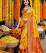 Sutriti exquisite yellow & red pochampalli soft silk saree with grand ikat woven pallu