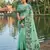 sea green linen saree with zari woven motifs