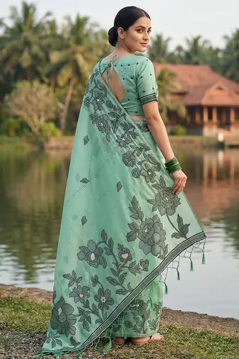 sea green linen saree with zari woven motifs