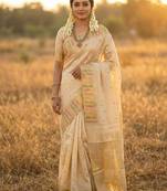 off-white kanchipuram silk saree with woven gold zari