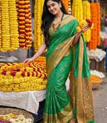 Sutriti exquisite green & brown pochampalli soft silk saree with grand ikat woven pallu