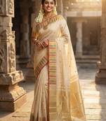 Sutriti off-white cream kerala style soft silk saree with gold zari border