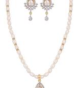 gold-toned pearl necklace set with teardrop pendant & crystal drop earrings
