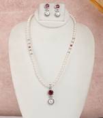 rhodium finish pearl necklace set with ruby crystal drop pendant