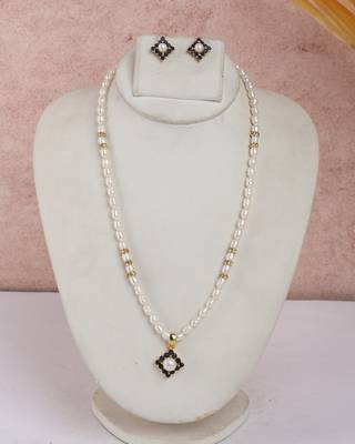 ivory pearl strand with deep navy floral pendant & matching studs 1