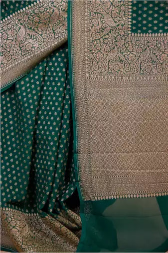 Green silk blend banarasi saree with unstitched blouse piece