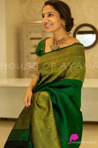 Green silk blend banarasi saree with unstitched blouse piece