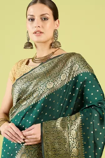 Green silk blend banarasi saree with unstitched blouse piece