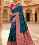 teal banarasi silk saree with pink zari border