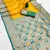 yellow soft banarasi silk saree with zari weaving meenakari design