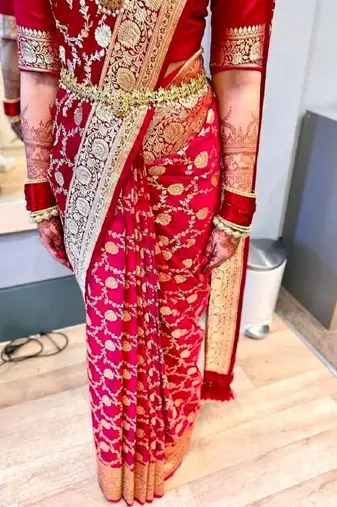 Red silk blend banarasi saree with unstitched blouse piece