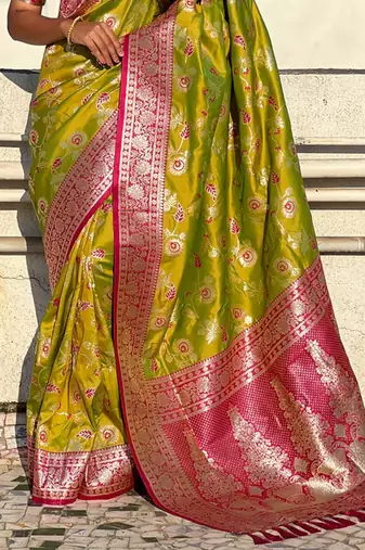 Green banarasi silk zari woven saree with contrast blouse piece