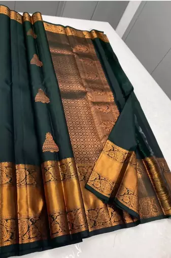 Green silk blend banarasi saree with unstitched blouse piece