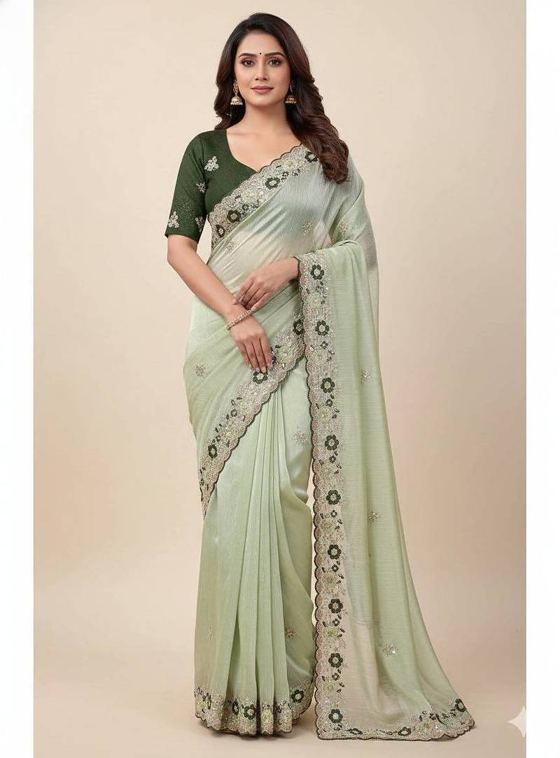 light green embroidery work organza saree