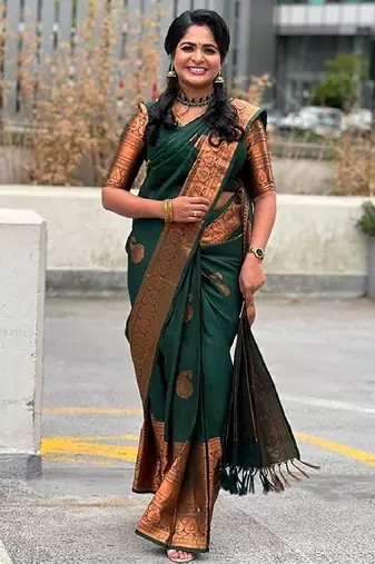 Green silk blend banarasi saree with unstitched blouse piece