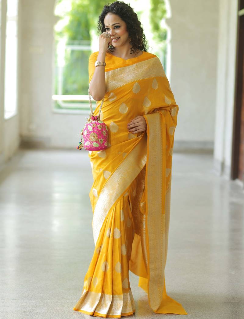 Yellow soft silk blend banarasi jacuard work designer party wear saree with unstitched blouse piece