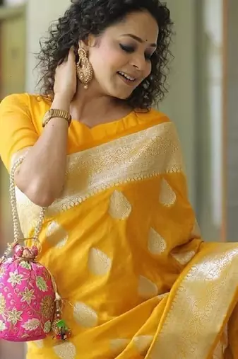 Yellow silk blend banarasi saree with unstitched blouse piece