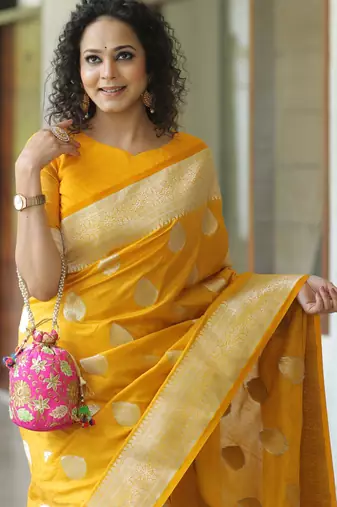 Yellow silk blend banarasi saree with unstitched blouse piece