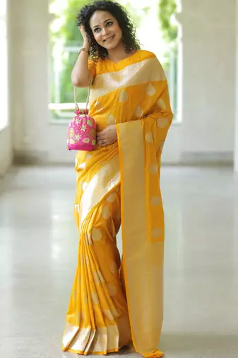 Yellow silk blend banarasi saree with unstitched blouse piece