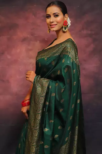 Green silk blend banarasi saree with unstitched blouse piece