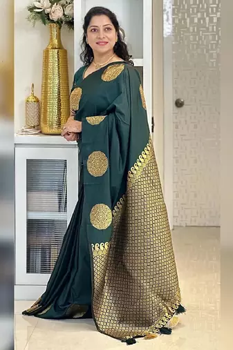 Green silk blend banarasi saree with unstitched blouse piece