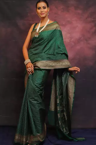 Green silk blend banarasi saree with unstitched blouse piece