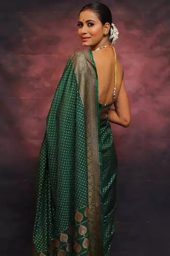 Green silk blend banarasi saree with unstitched blouse piece