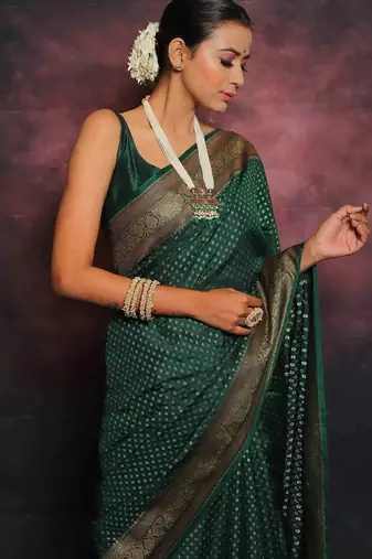 Green silk blend banarasi saree with unstitched blouse piece