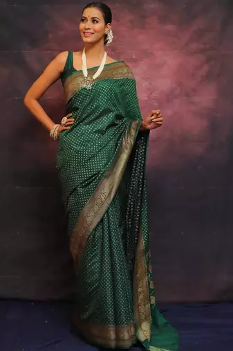Green silk blend banarasi saree with unstitched blouse piece