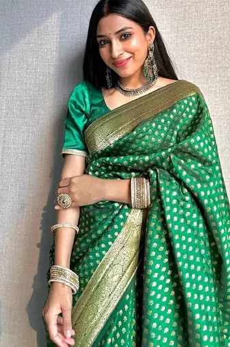 Green silk blend banarasi saree with unstitched blouse piece