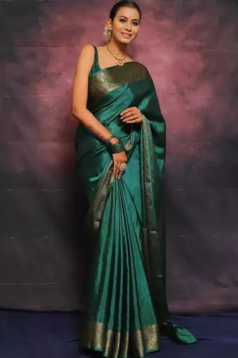 Green silk blend banarasi saree with unstitched blouse piece