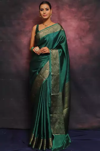 Green silk blend banarasi saree with unstitched blouse piece