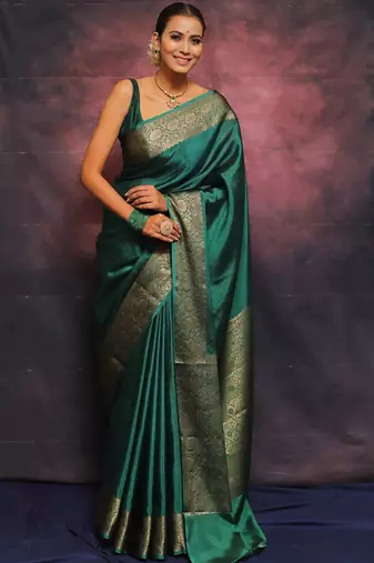 Green silk blend banarasi saree with unstitched blouse piece