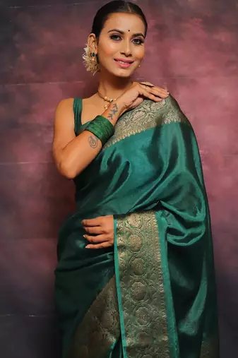 Green silk blend banarasi saree with unstitched blouse piece