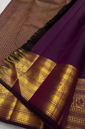 Purple silk blend banarasi saree with unstitched blouse piece