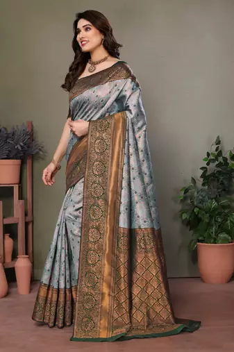 Green silk blend banarasi saree with unstitched blouse piece
