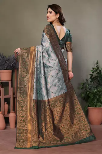 Green silk blend banarasi saree with unstitched blouse piece