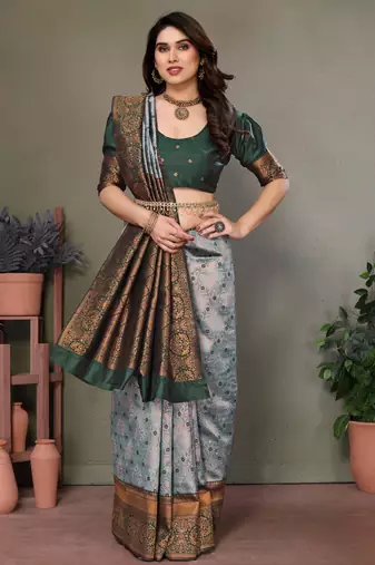 Green silk blend banarasi saree with unstitched blouse piece