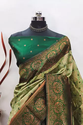 Pista green silk blend banarasi saree with unstitched blouse piece