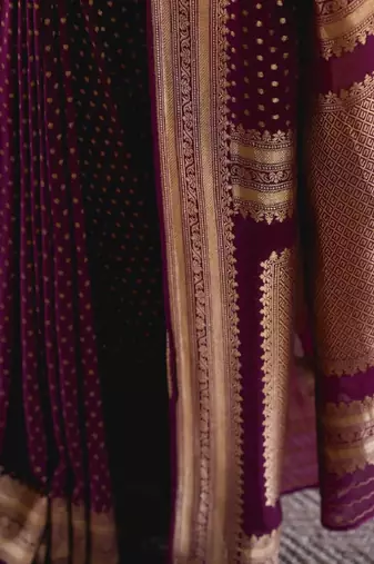 Purple silk blend banarasi saree with unstitched blouse piece