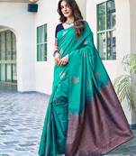 Teal green soft silk blend banarasi jacuard work designer party wear saree with unstitched blouse piece