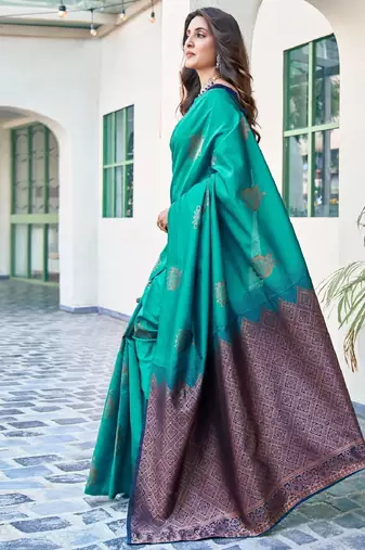Teal green silk blend banarasi saree with unstitched blouse piece